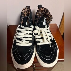 Vans Black High-Top Sneakers with Leopard Print Lining.